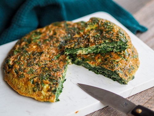 Trouchia French traditional omelette with swiss chard leaves and fresh herbs