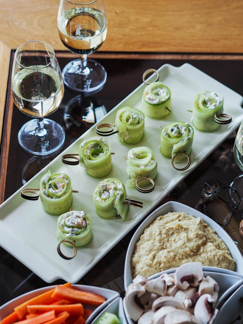 French appetizer with cucumber and salmon roll-ups