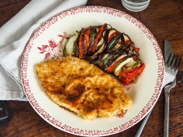 breaded escalope served with vegetable tian