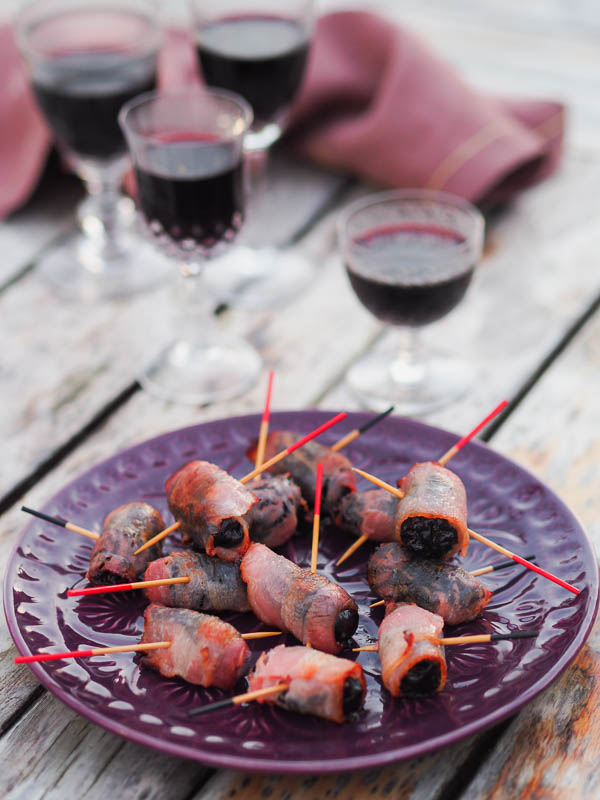 fun apero idea bacon wrapped prunes with bacon with red wine