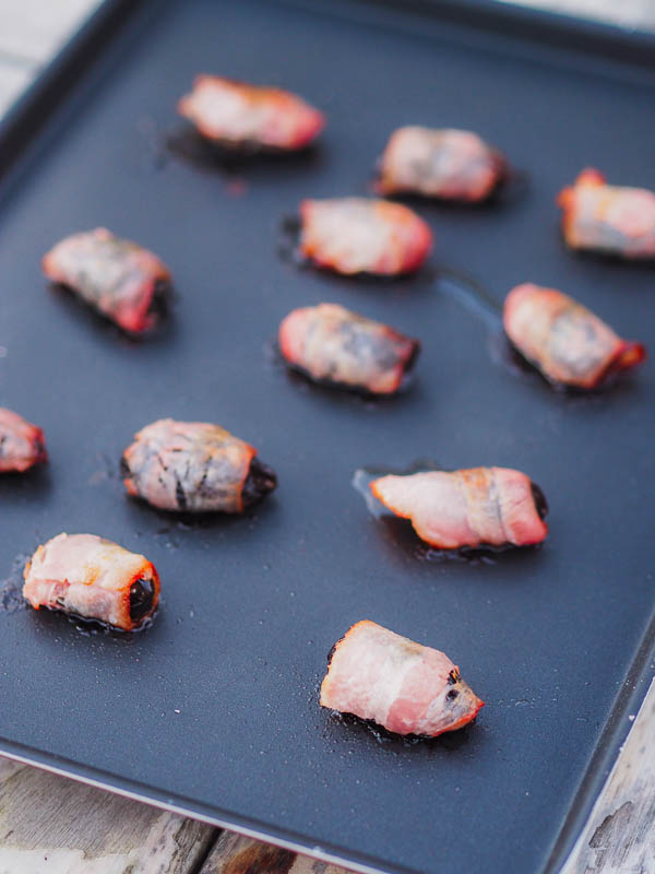 baking sheet to cook the bacon wrapped around some prunes